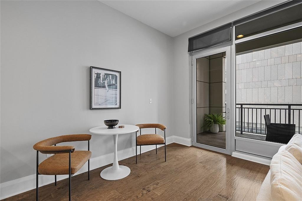 301 Fifth Avenue, Unit 506 Pittsburgh, PA 15222 - Photo 8 of 21 a view of a workspace with furniture and wooden floor