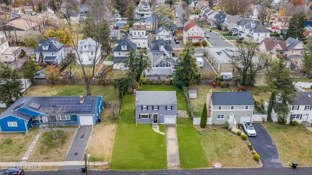 an aerial view of residential building and city view