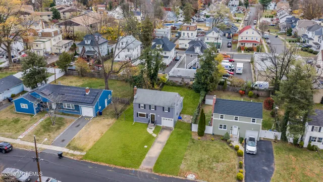 an aerial view of residential building and lake view