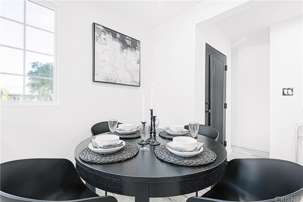 6725 Belmar Avenue Reseda, CA 91335 - Photo 17 of 32 a room with furniture and a window