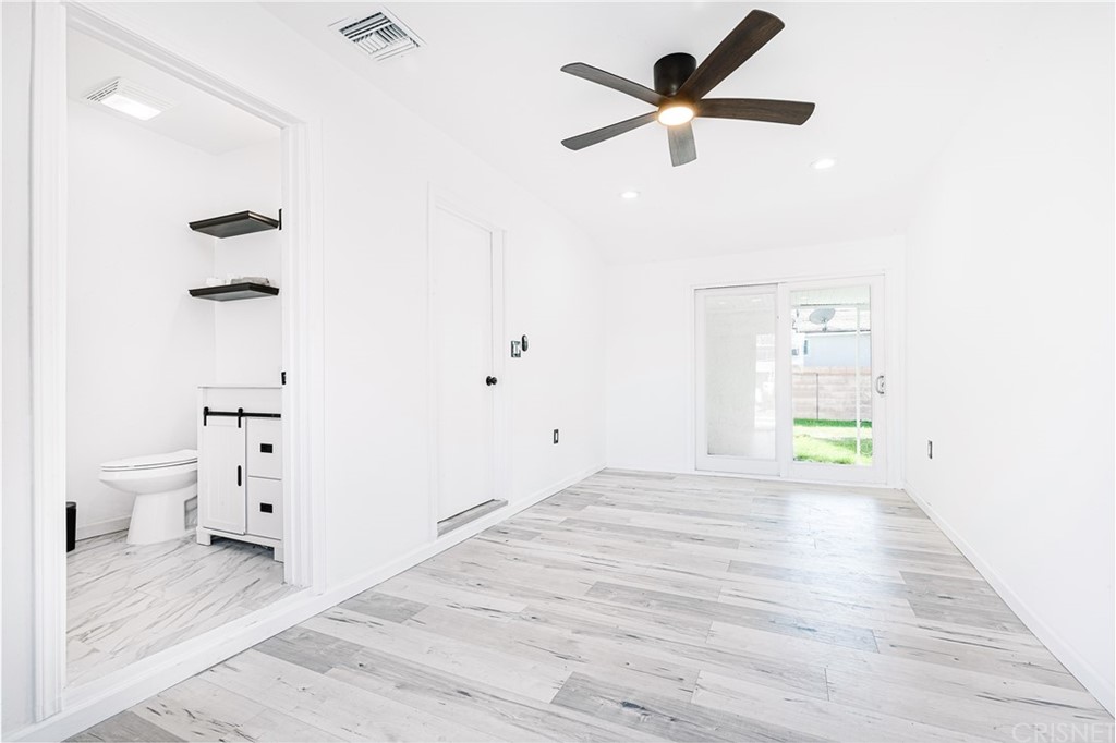 6725 Belmar Avenue Reseda, CA 91335 - Photo 20 of 32 a view of an empty room and window