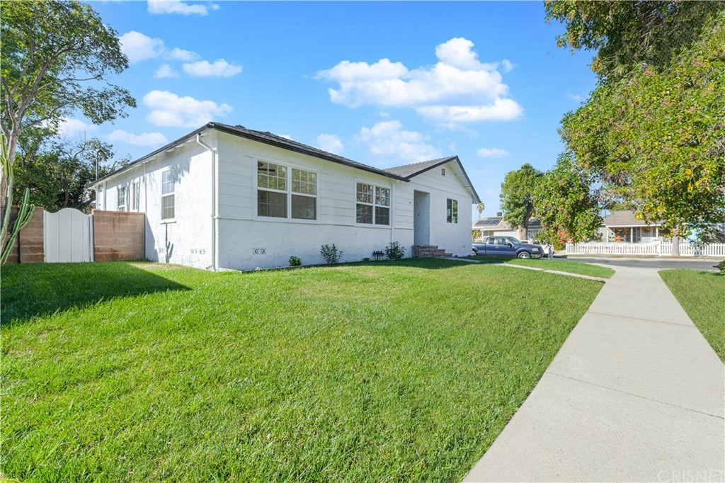 6725 Belmar Avenue Reseda, CA 91335 - Photo 2 of 32 a view of house with a yard
