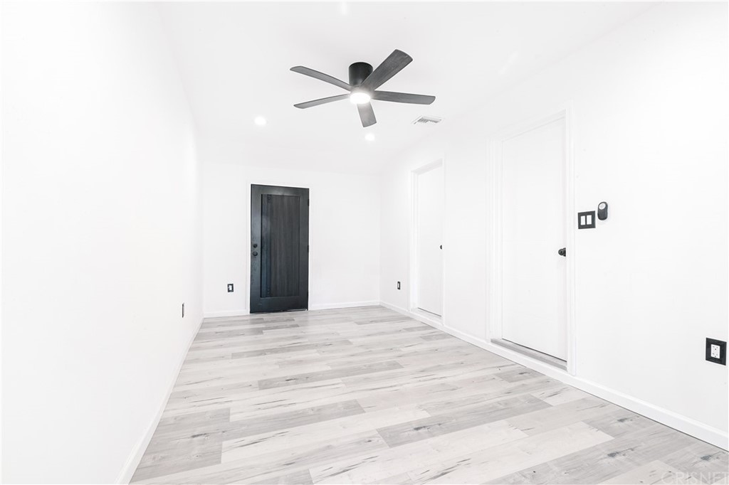 6725 Belmar Avenue Reseda, CA 91335 - Photo 21 of 32 a view of a big room with closet and ceiling fan
