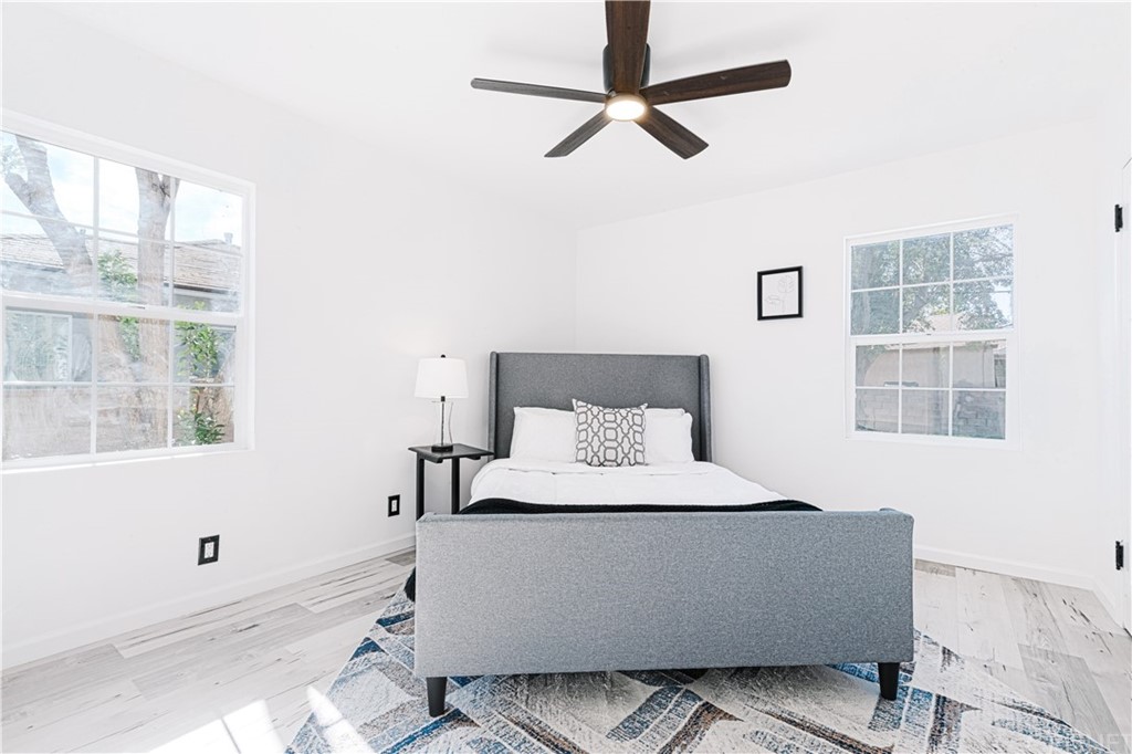 6725 Belmar Avenue Reseda, CA 91335 - Photo 24 of 32 a bedroom with a bed and a window