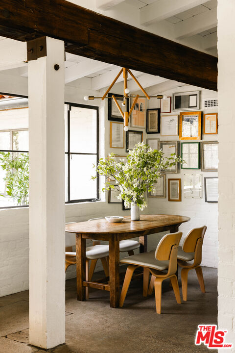 1830 Old Orchard Road Los Angeles, CA 90049 - Photo 7 of 30 a dining room with furniture and window
