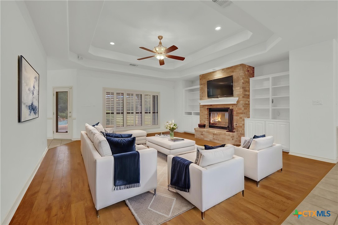8472 Rolling Acres Trail Fair Oaks Ranch, TX 78015 - Photo 7 of 37 Virtually Staged Living Room
