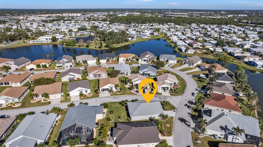 24415 Buckingham Way Punta Gorda, FL 33980 - Photo 20 of 41 an aerial view of a city with houses