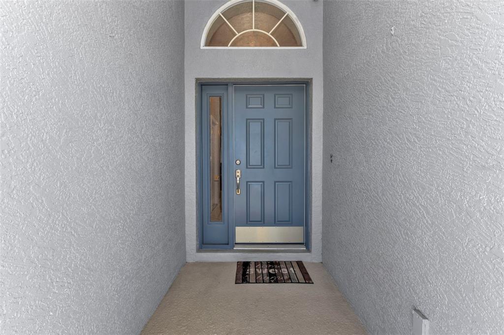 24415 Buckingham Way Punta Gorda, FL 33980 - Photo 3 of 41 a view of an entryway door