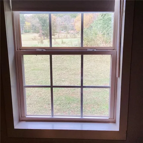 a view of a room that has a window