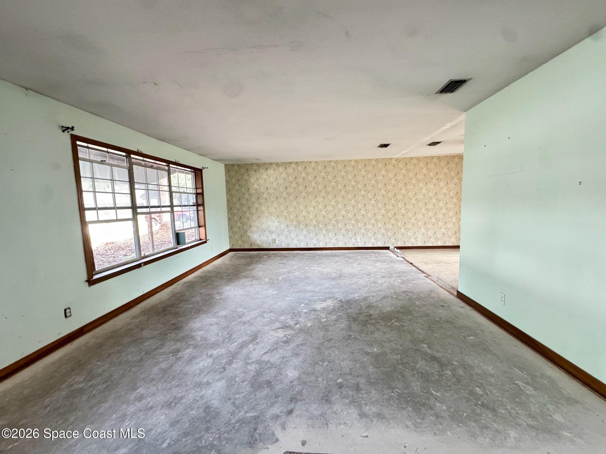876 Remsen Avenue Northwest Palm Bay, FL 32907 - Photo 2 of 17 IMG_7417