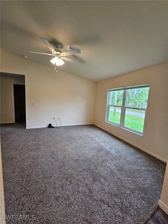 1506 Rugby Circle LaBelle, FL 33935 - Photo 8 of 13 an empty room with windows and fan