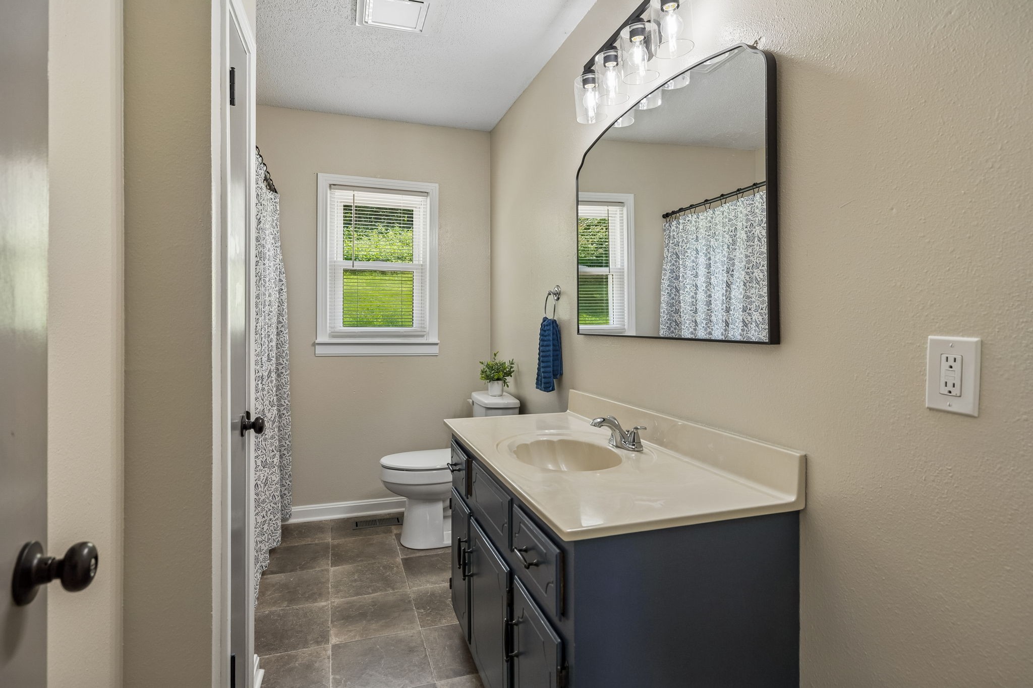 14 Morris Lane Carthage, TN 37030 - Photo 26 of 31 a bathroom with a sink and a mirror
