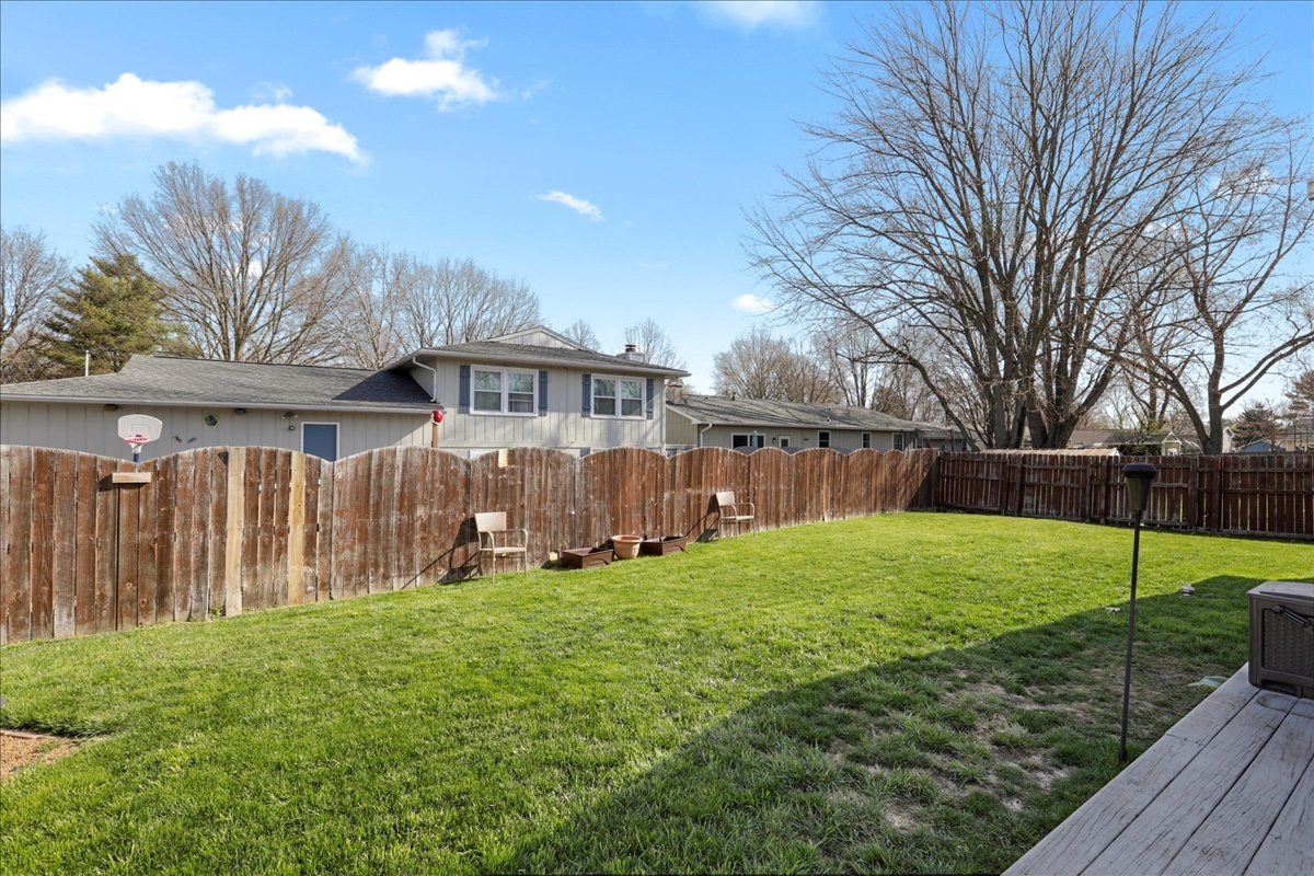 2302 Branch Road Champaign, IL 61821 - Photo 19 of 19 a view of a house with backyard and a tree