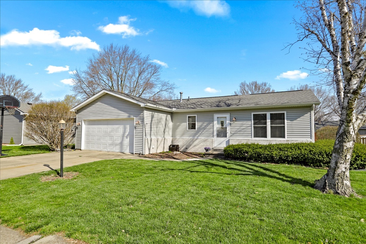 2302 Branch Road Champaign, IL 61821 - Photo 2 of 19 a front view of house with yard and green space