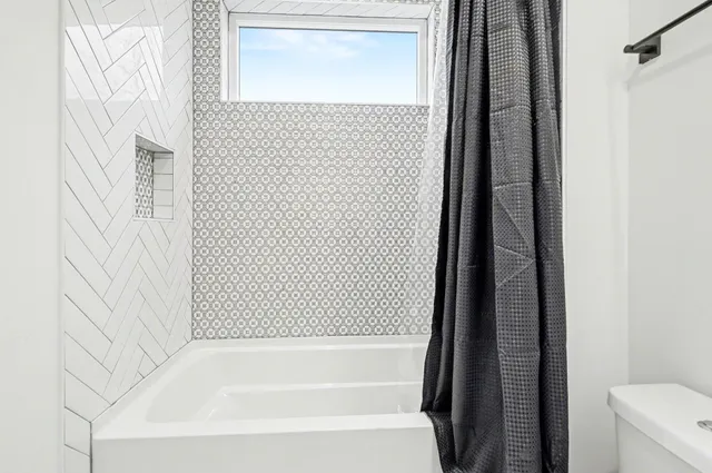 a bathroom with a bathtub