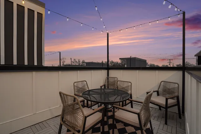 a view of a chairs and table in the terrace