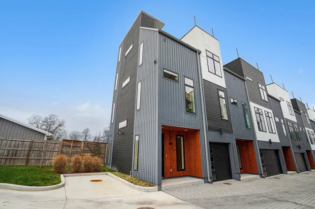 a view of a street with buildings