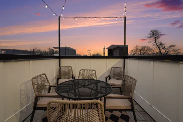 a building outdoor space with patio furniture