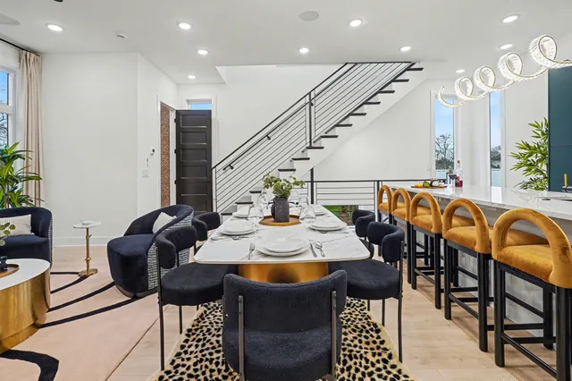 a view of a dining room with furniture