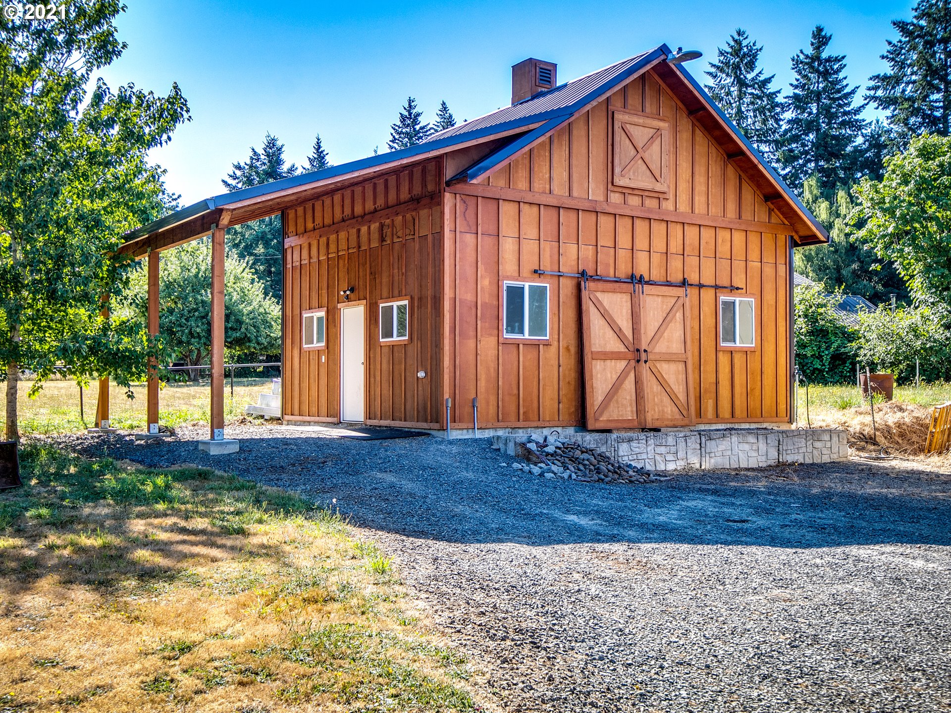 35412 Southeast Shade Tree Lane Estacada, OR 97023 - Photo 27 of 32 a view of front of house with wooden fence