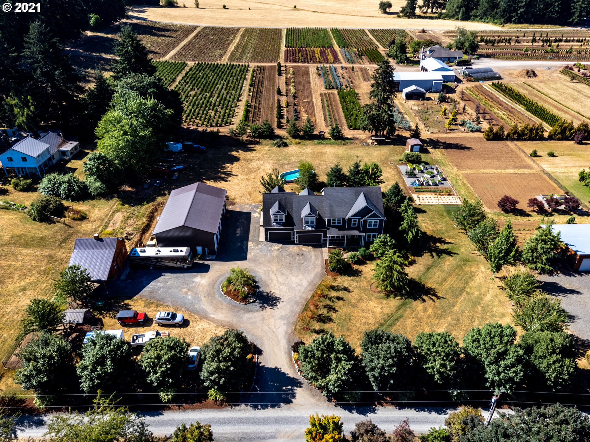 35412 Southeast Shade Tree Lane Estacada, OR 97023 - Photo 29 of 32 an aerial view of residential houses with outdoor space