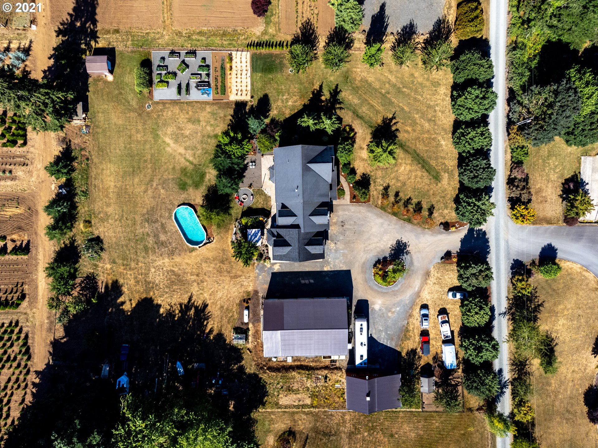 35412 Southeast Shade Tree Lane Estacada, OR 97023 - Photo 30 of 32 an aerial view of a house with a swimming pool