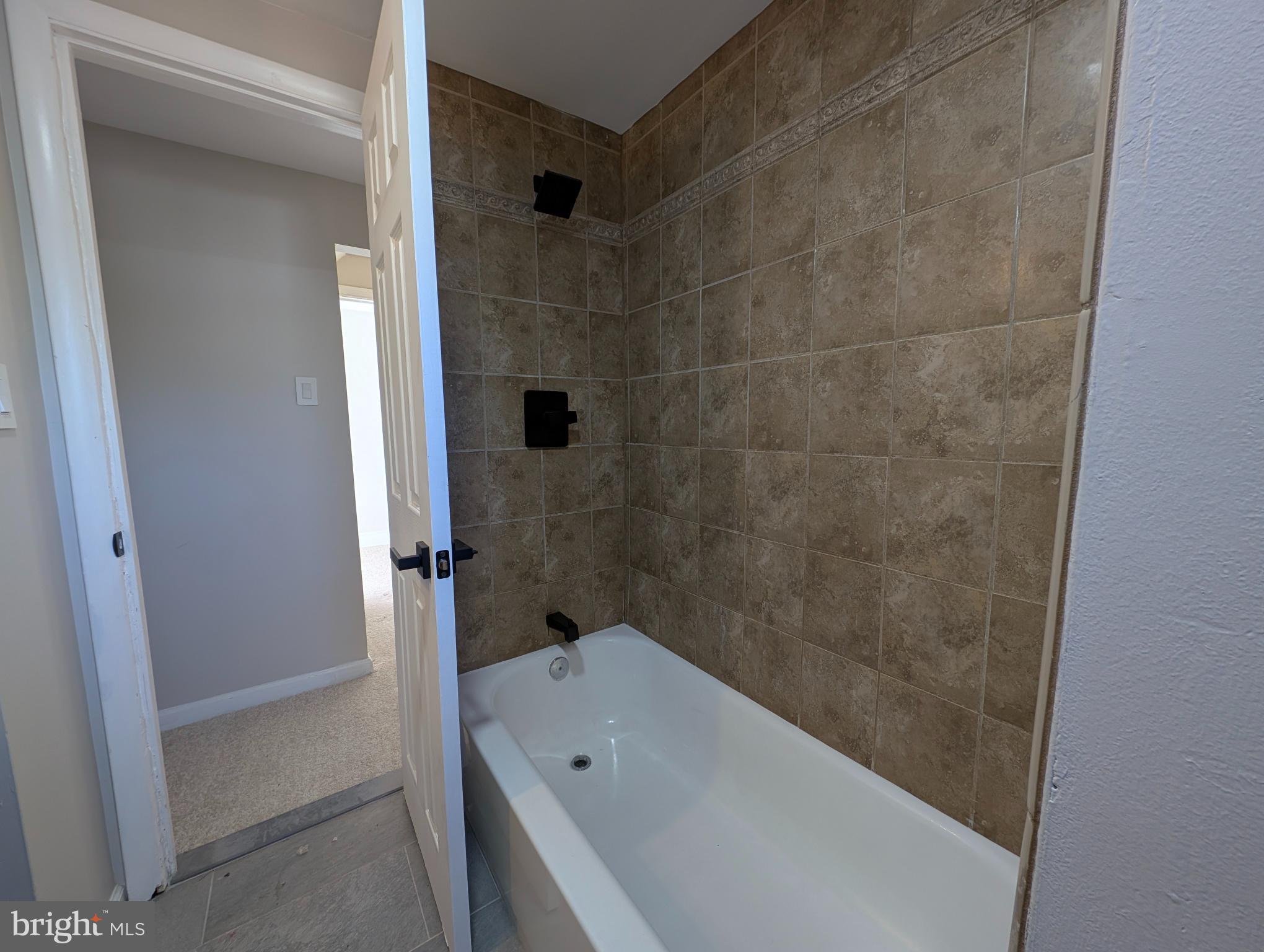 23 West Monroe Street Mount Holly, NJ 08060 - Photo 15 of 20 Modern bathroom with elegant tile accents.