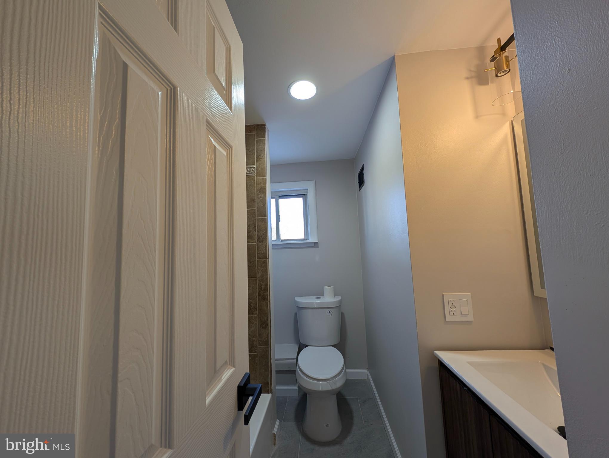23 West Monroe Street Mount Holly, NJ 08060 - Photo 17 of 20 Modern bathroom with sleek design elements.