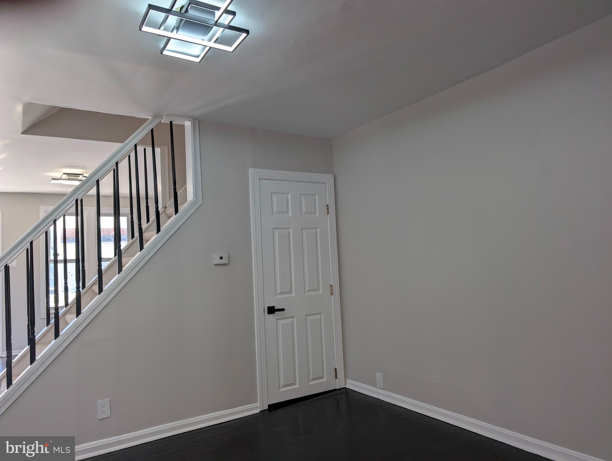23 West Monroe Street Mount Holly, NJ 08060 - Photo 4 of 20 Modern entryway with sleek design elements.