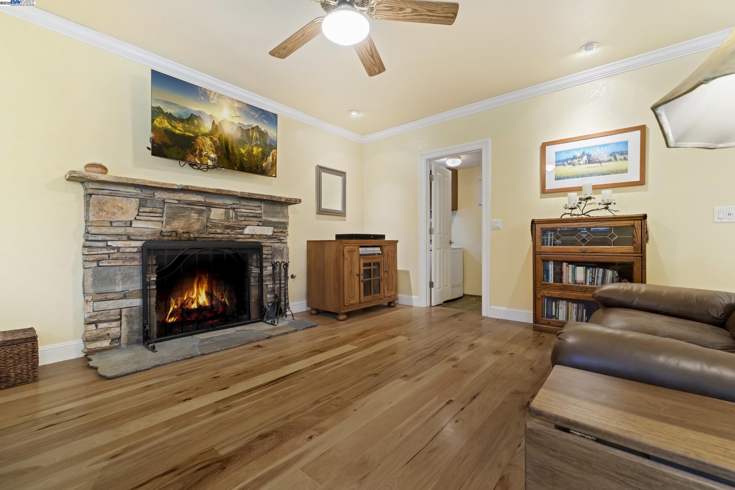 5145 Springdale Avenue Pleasanton, CA 94588 - Photo 12 of 51 a living room with furniture and a fireplace