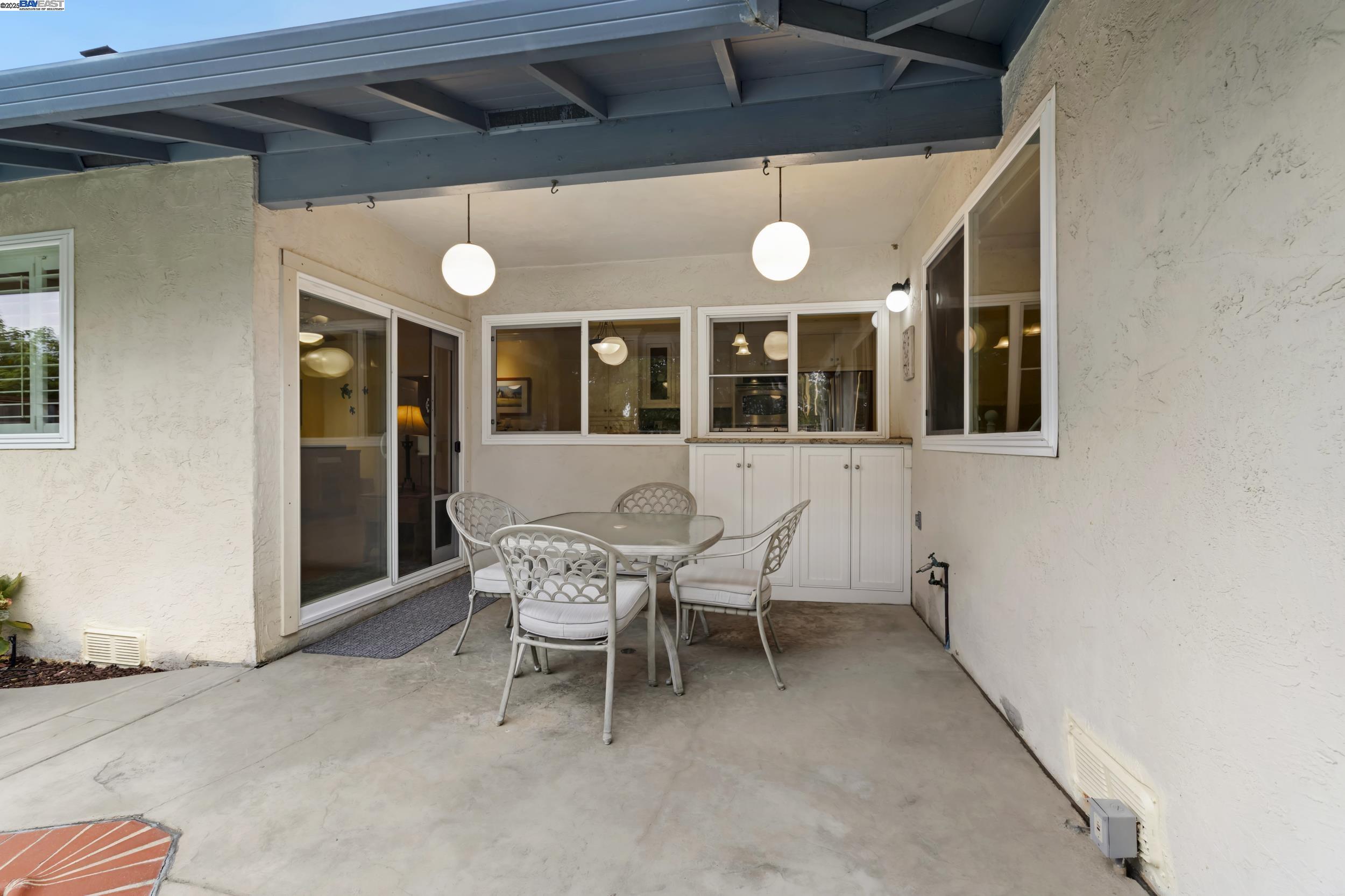 5145 Springdale Avenue Pleasanton, CA 94588 - Photo 31 of 51 a patio with a table and chairs