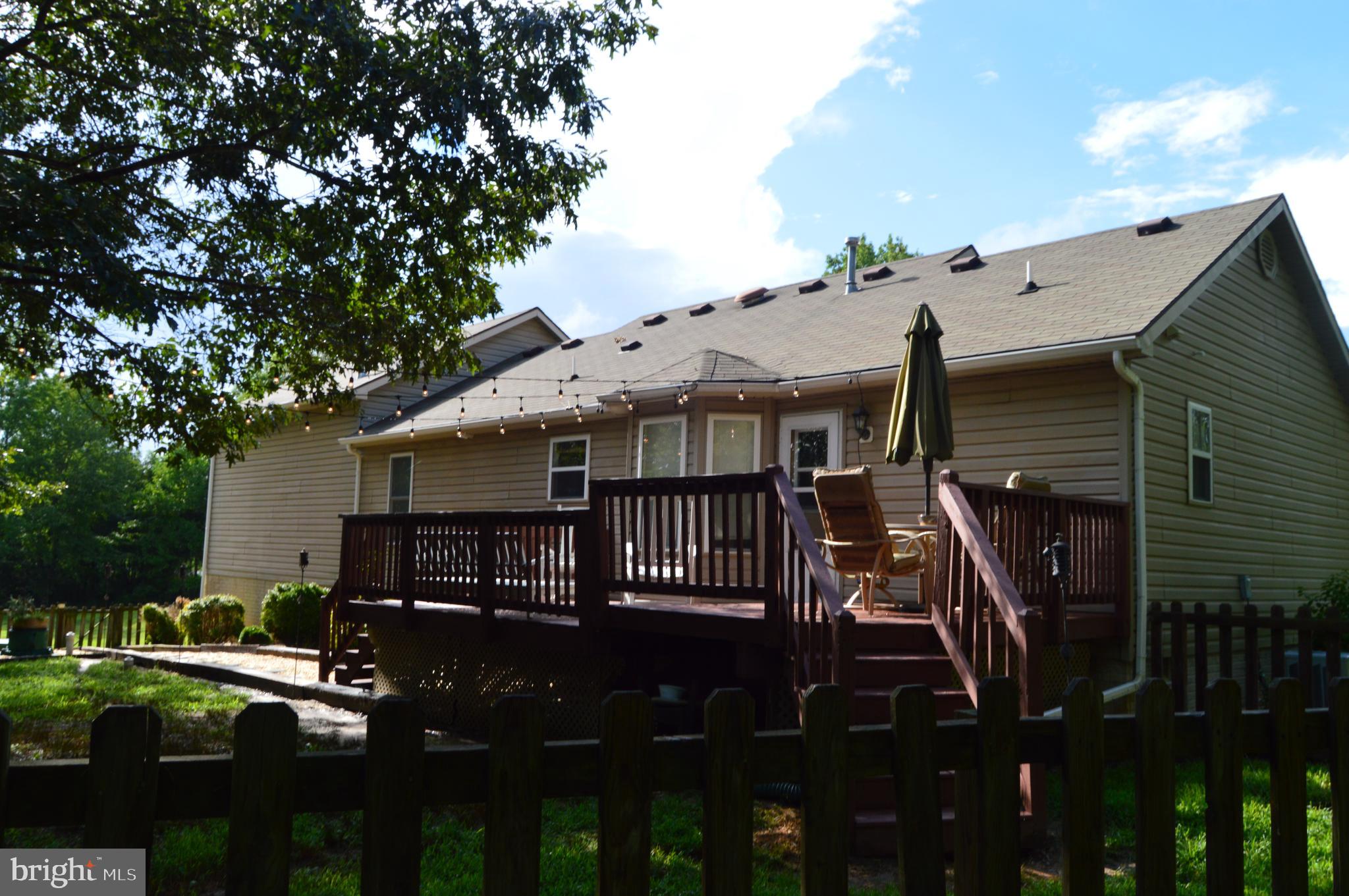 12041 Jesse Lane Ruther Glen, VA 22546 - Photo 14 of 40 Deck From back yard