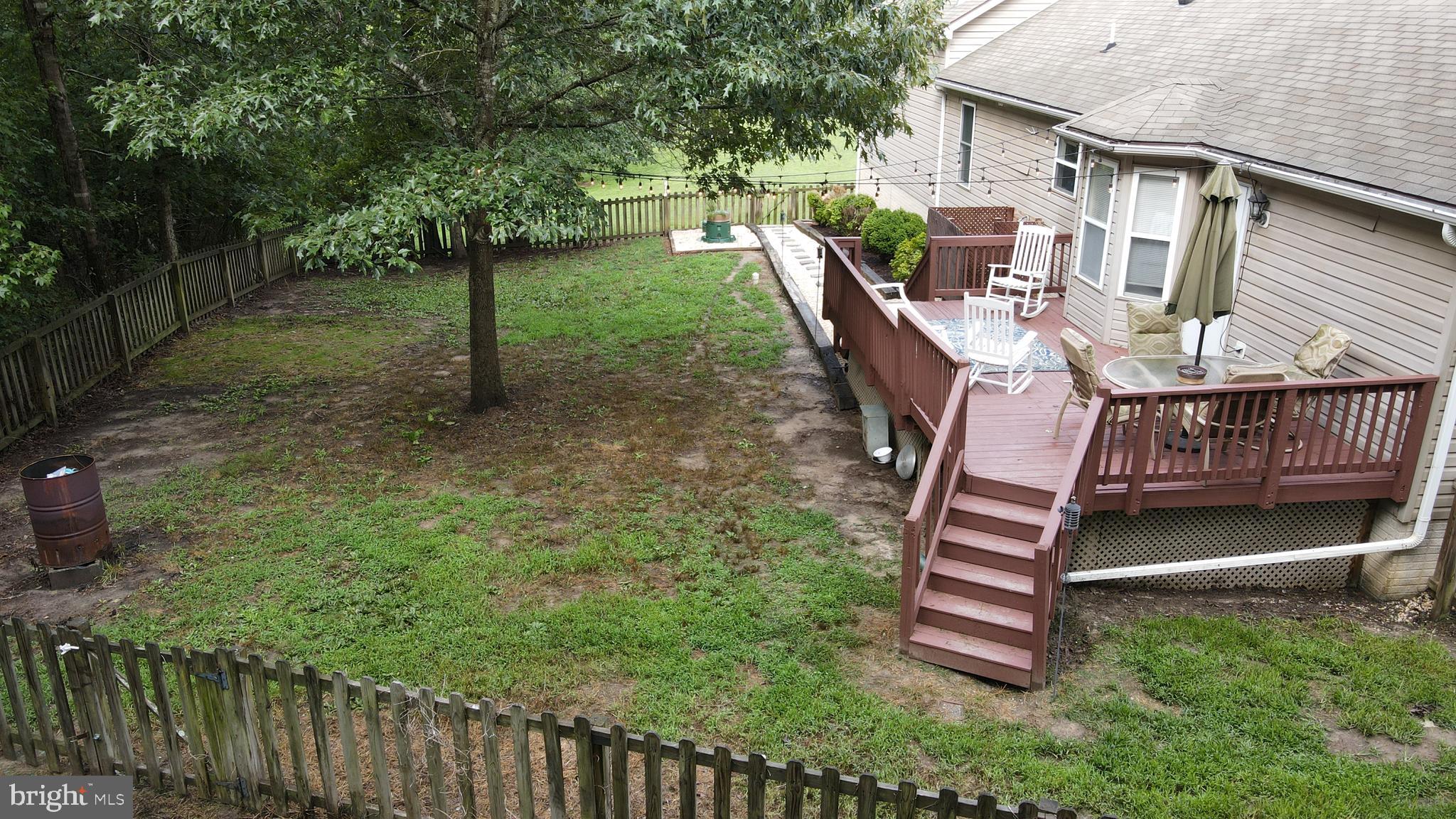 12041 Jesse Lane Ruther Glen, VA 22546 - Photo 15 of 40 Rear , mature tree for shade, fence for the pups