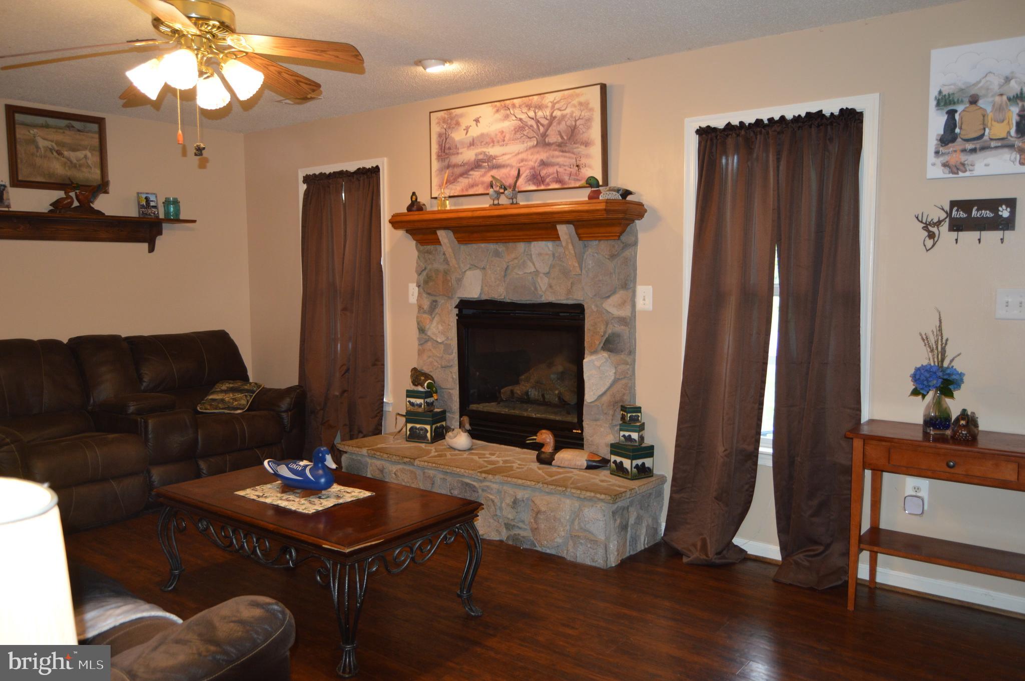 12041 Jesse Lane Ruther Glen, VA 22546 - Photo 16 of 40 Stone Fireplace