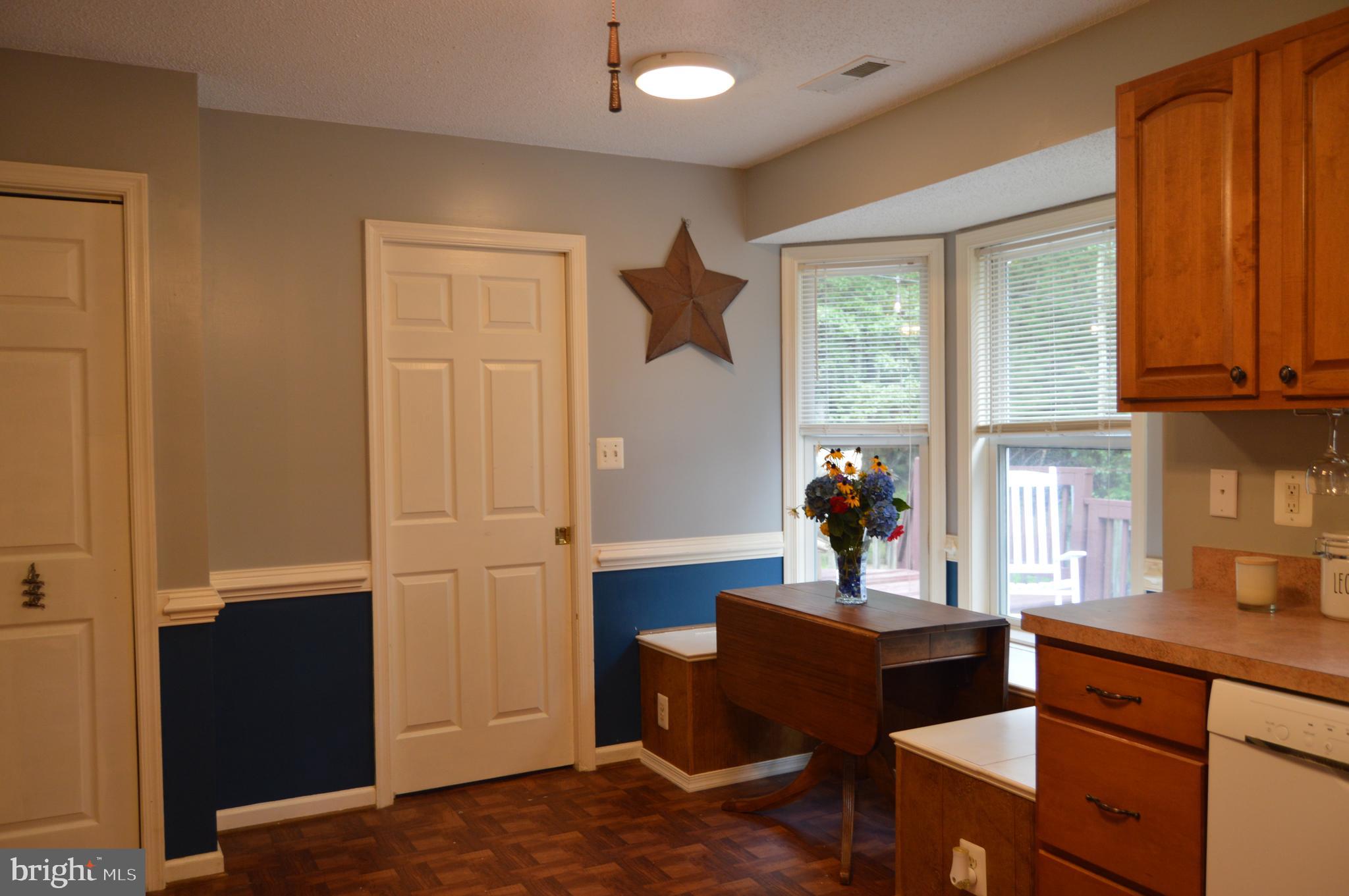 12041 Jesse Lane Ruther Glen, VA 22546 - Photo 19 of 40 Kitchen with pocket door into utility room