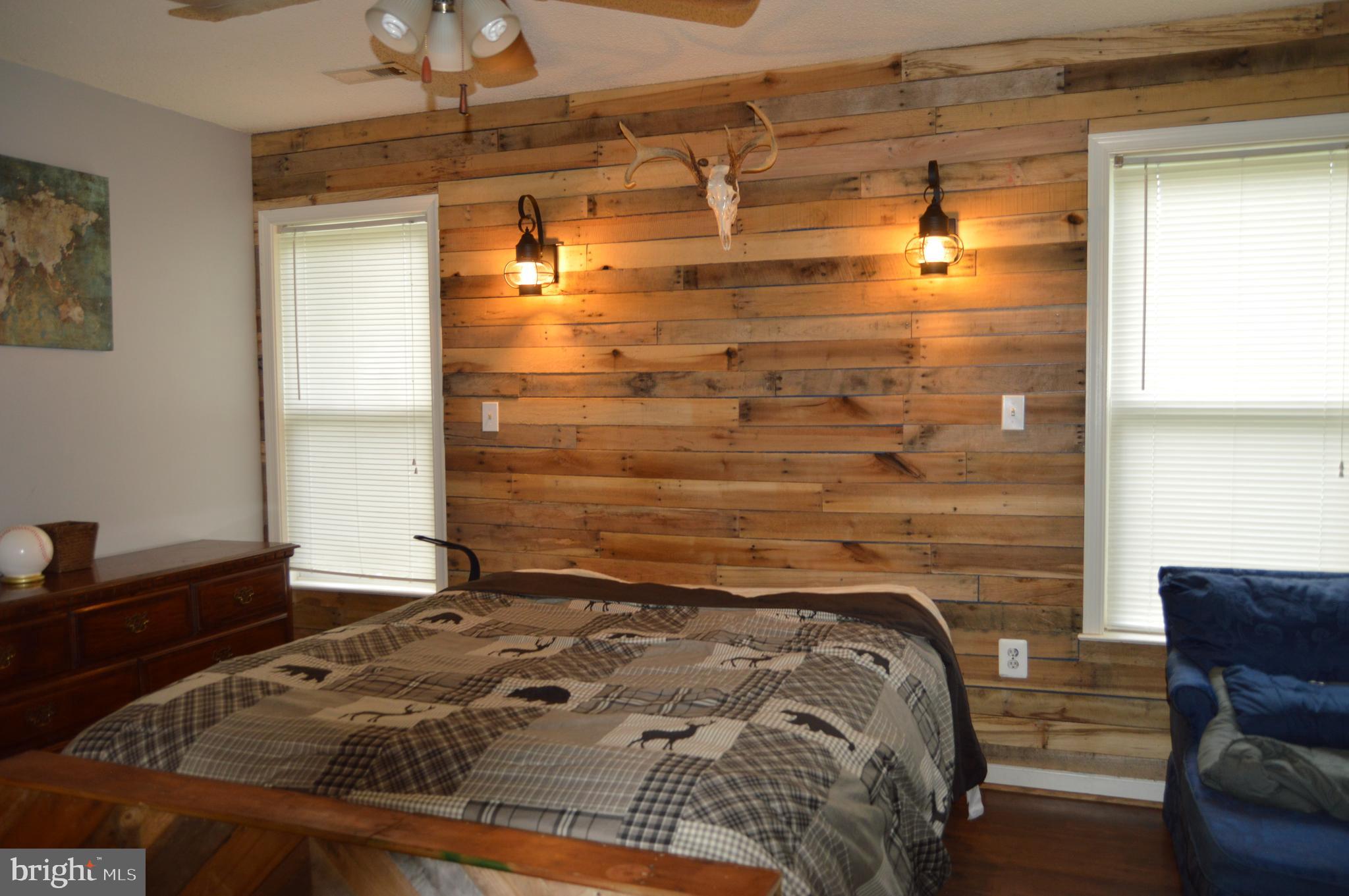 12041 Jesse Lane Ruther Glen, VA 22546 - Photo 24 of 40 Owners suite, upcycled accent wall