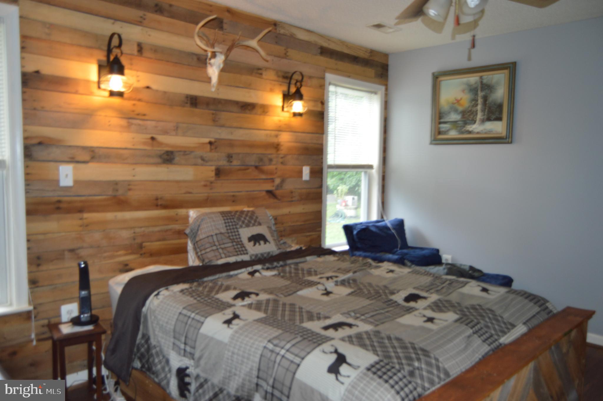 12041 Jesse Lane Ruther Glen, VA 22546 - Photo 25 of 40 Two windows make this room cozy and bright