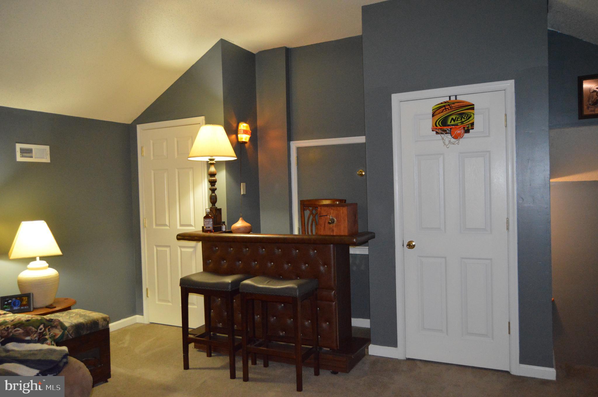 12041 Jesse Lane Ruther Glen, VA 22546 - Photo 31 of 40 Easy attic access from this room