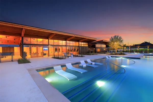 a view of a house with swimming pool