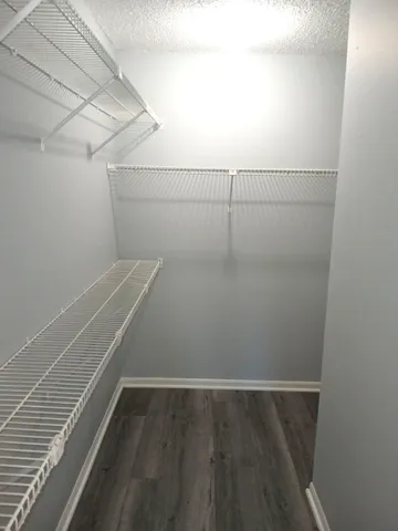 a view of a room with racks on the wall