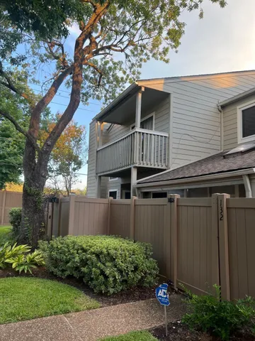 a house view with a garden space