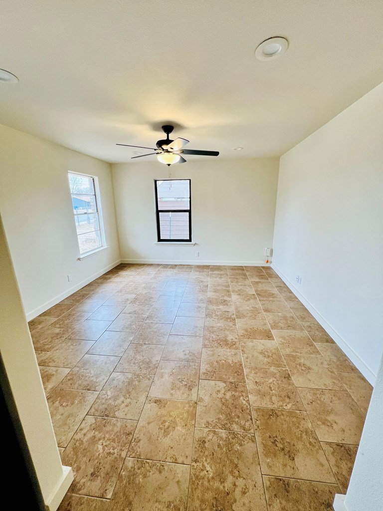 303 Meadow View Lane Kerrville, TX 78028 - Photo 2 of 12 wooden floor in an empty room