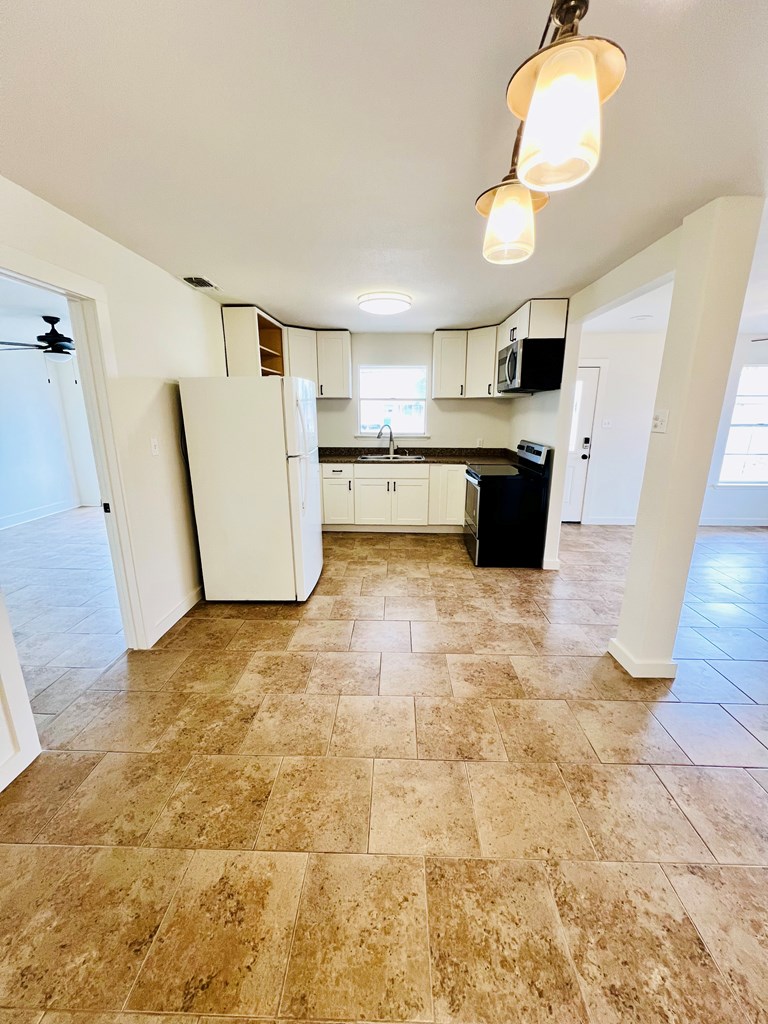 303 Meadow View Lane Kerrville, TX 78028 - Photo 4 of 12 a view of a kitchen with a sink