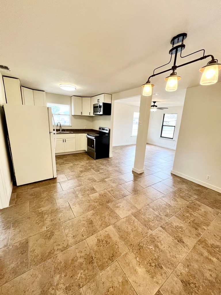 303 Meadow View Lane Kerrville, TX 78028 - Photo 5 of 12 a view of a kitchen with a sink