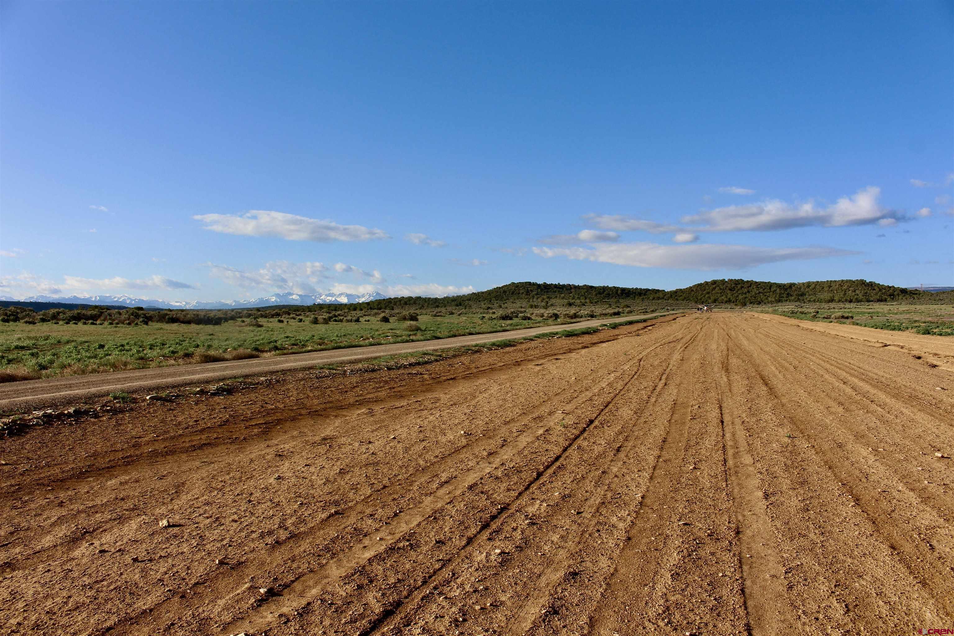 Tin Cup Lot 2 6300th Road Montrose, CO 81403 - Photo 12 of 14 a view of an ocean beach