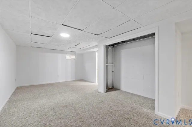 a bathroom with a double vanity sink a mirror and a shower