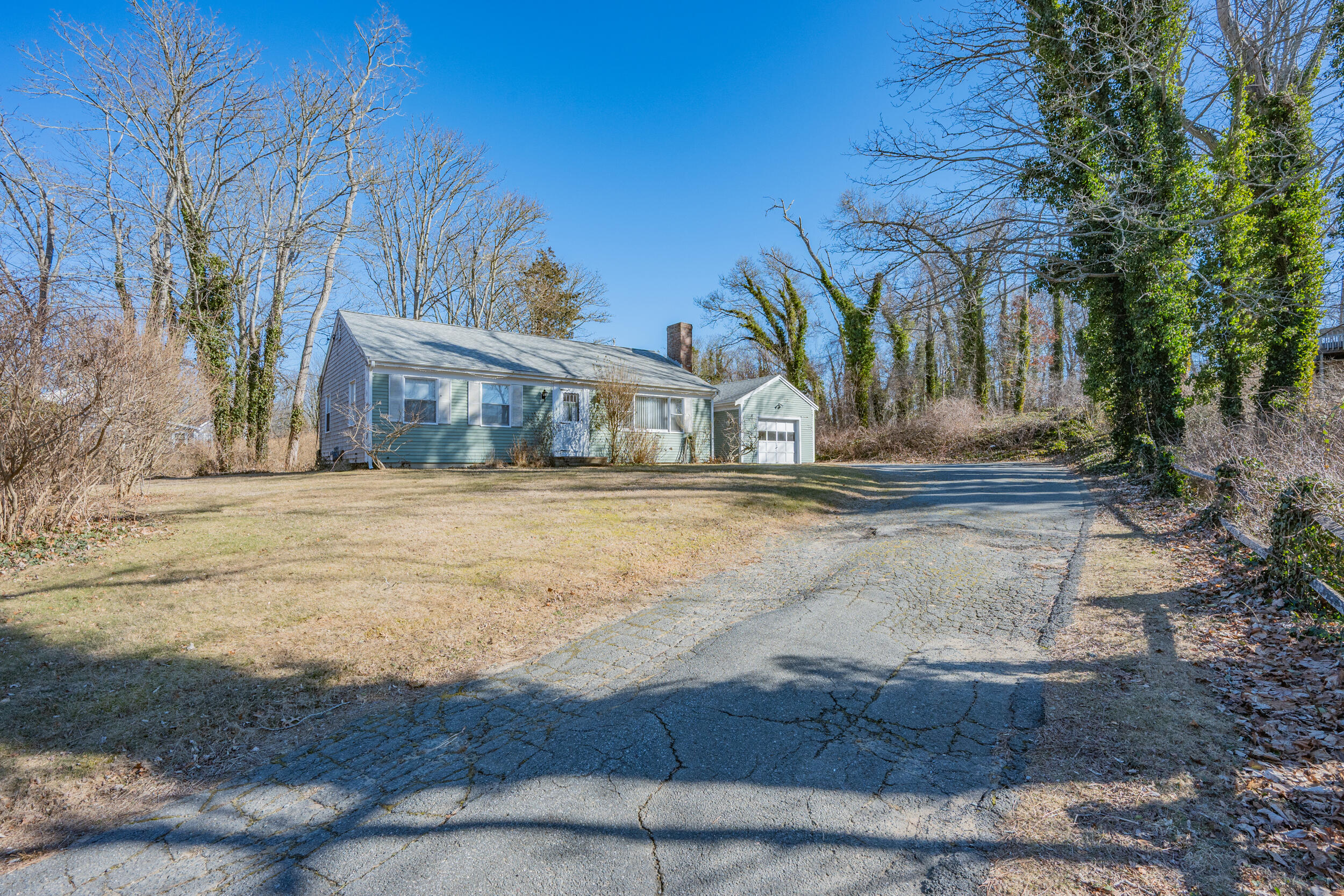 5 Tonset Road Orleans, MA 02653 - Photo 23 of 33 a view of a house with a yard