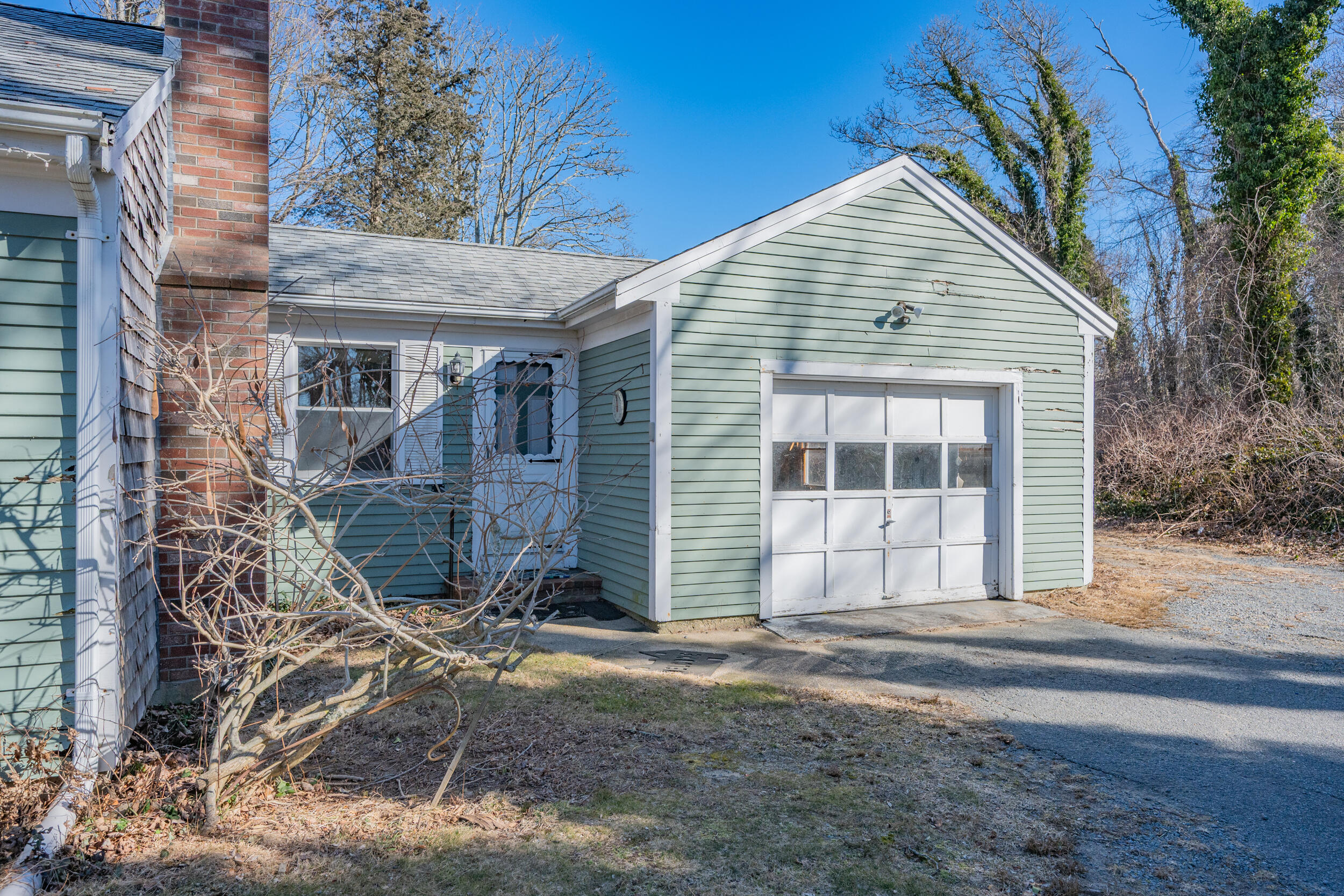 5 Tonset Road Orleans, MA 02653 - Photo 26 of 33 a front view of a house with a yard