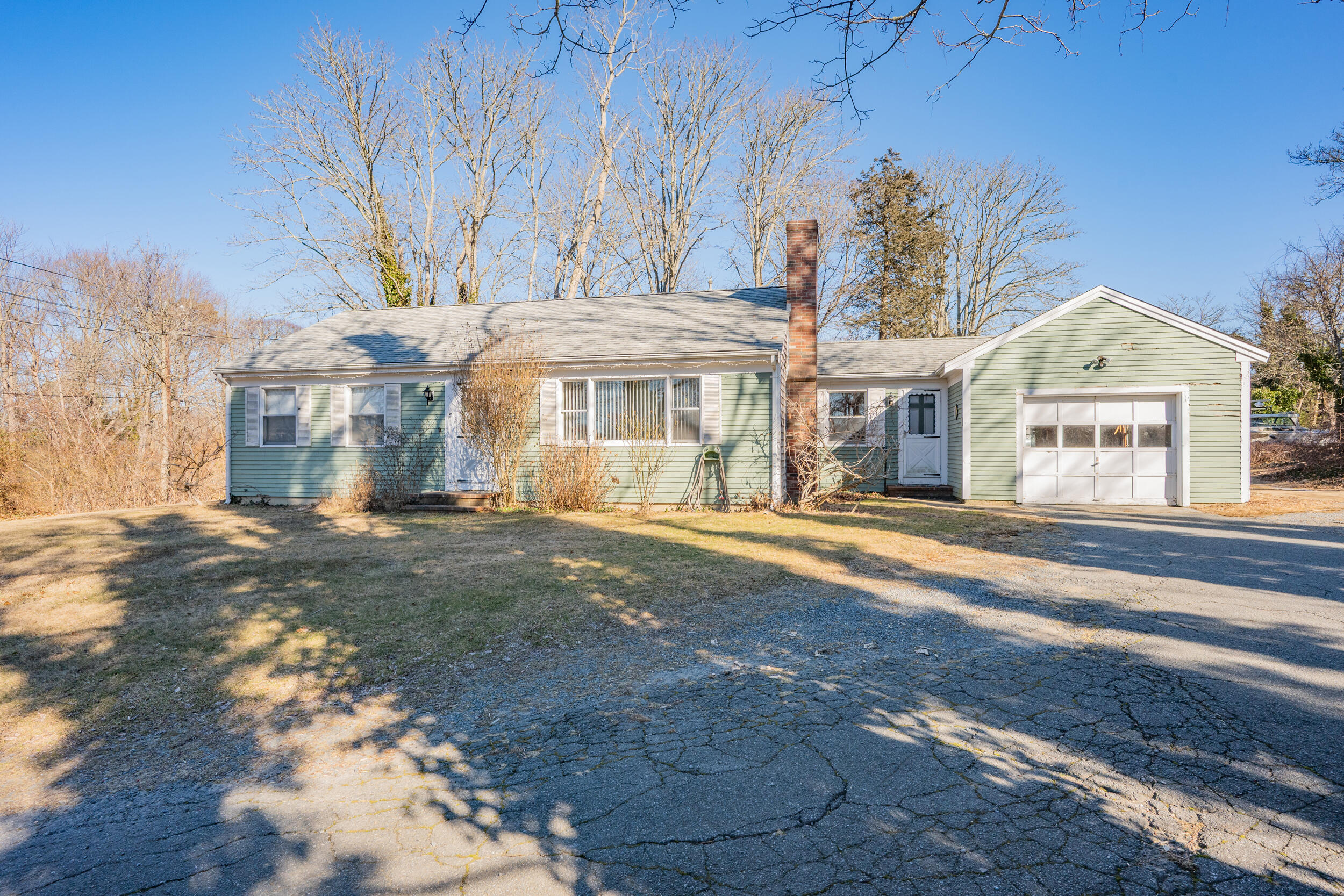5 Tonset Road Orleans, MA 02653 - Photo 3 of 33 a front view of a house with a yard