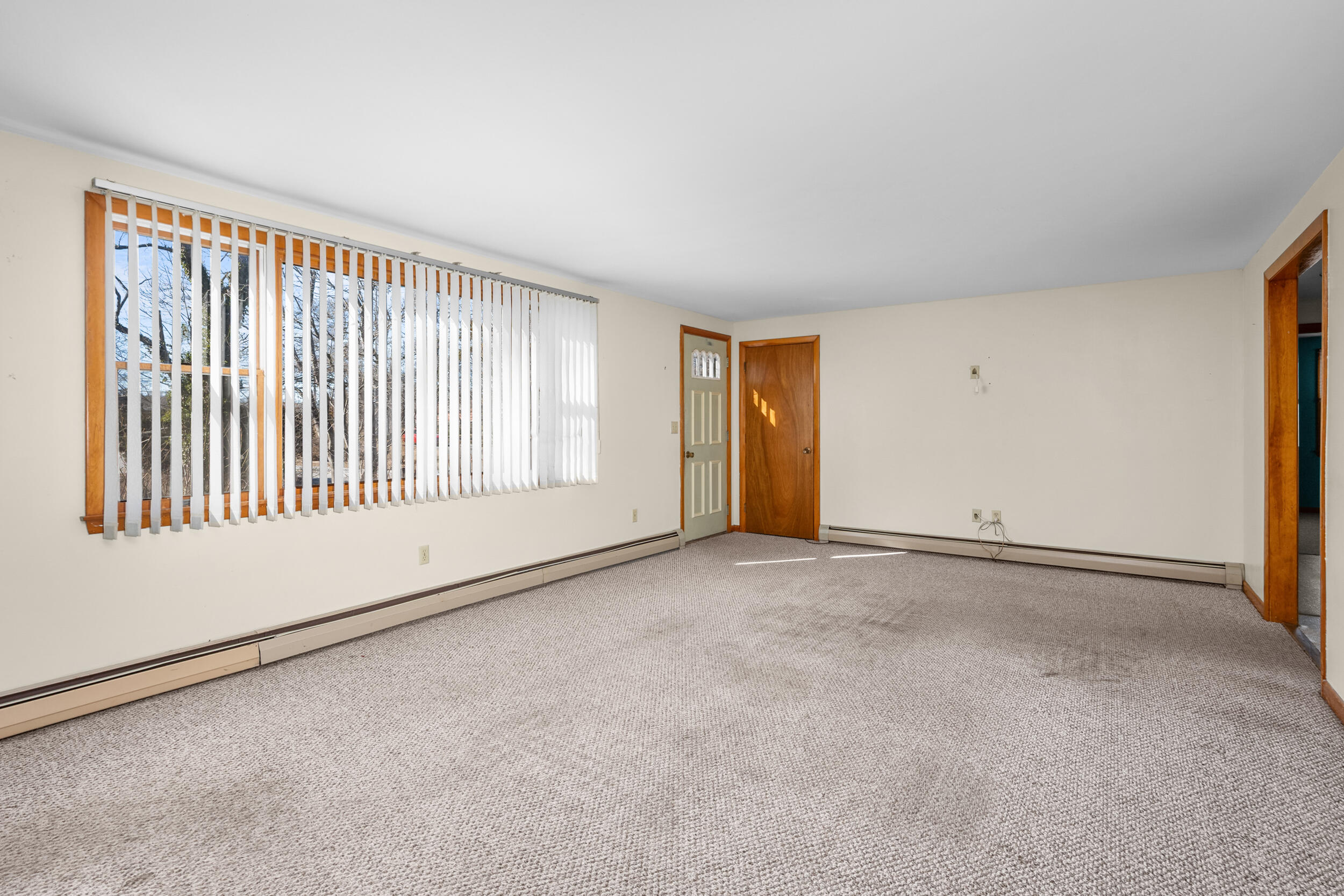 5 Tonset Road Orleans, MA 02653 - Photo 8 of 33 a view of an empty room with a window